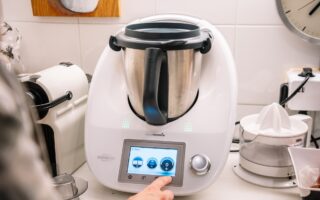 Barcelona, Spain, 15 January, 2021: Two women using thermomix at home