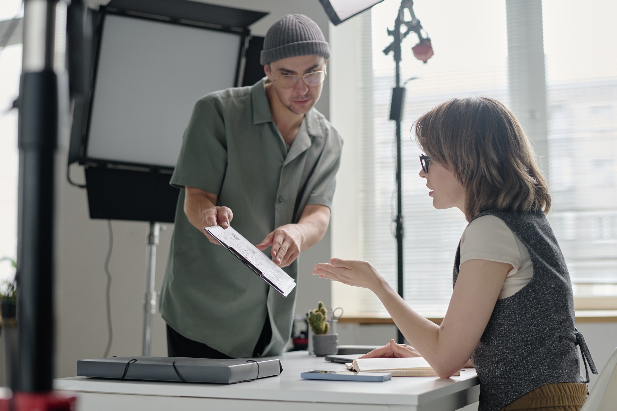 Director Showing Script to Actress