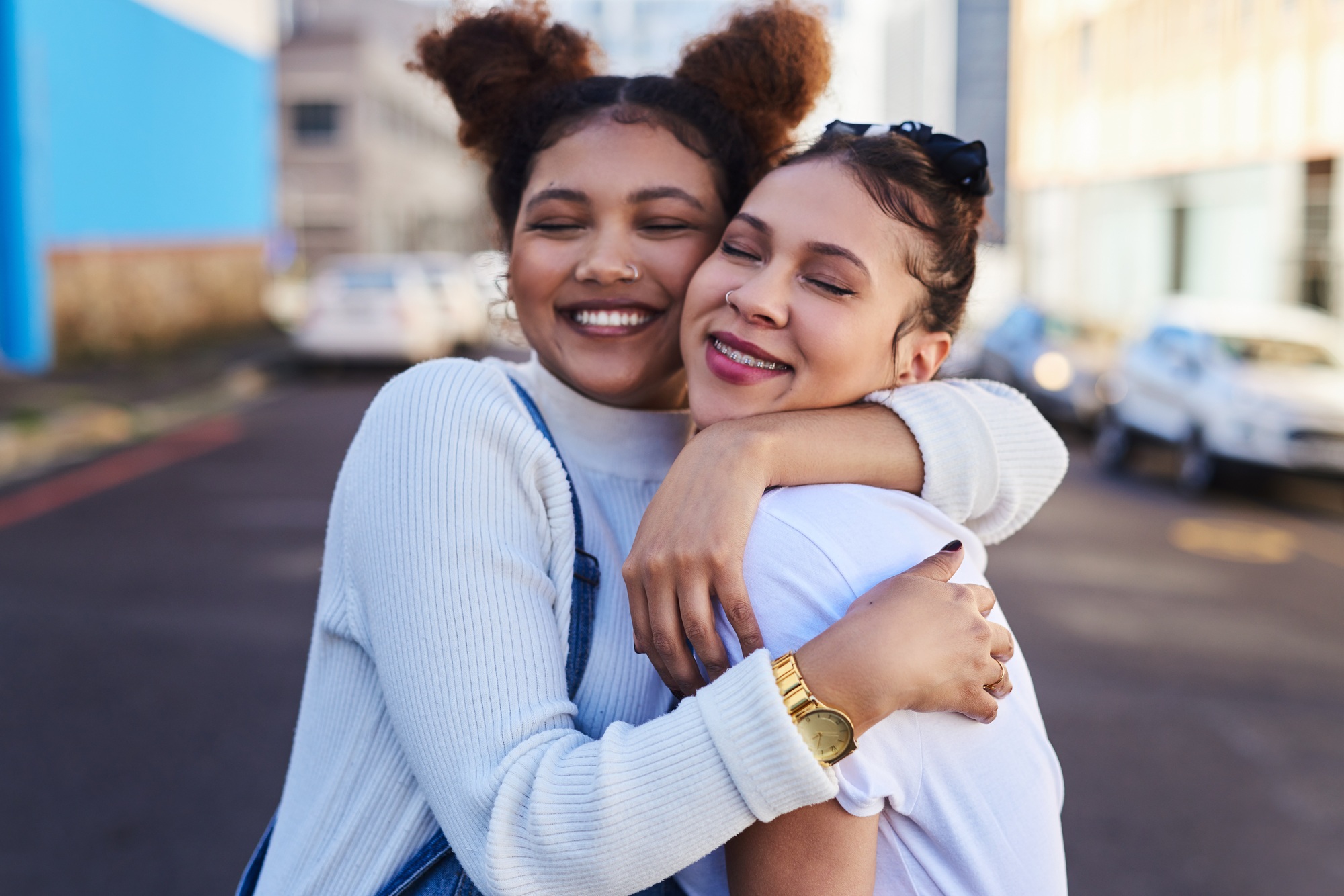 My bestie and I are inseparable. Cropped shot of two young woman out in the city during the day.